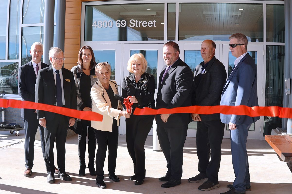 ribbon-cutting-group-1200x796